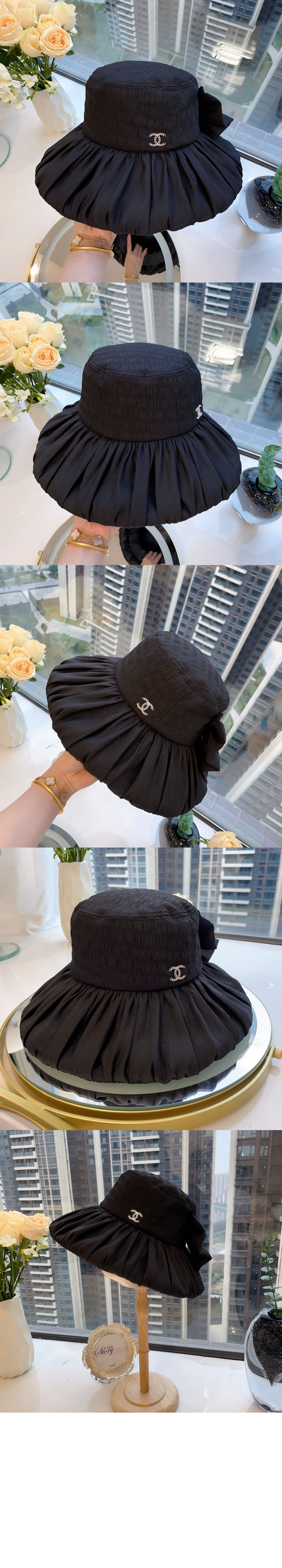 선캡 AA9257 > 샤넬