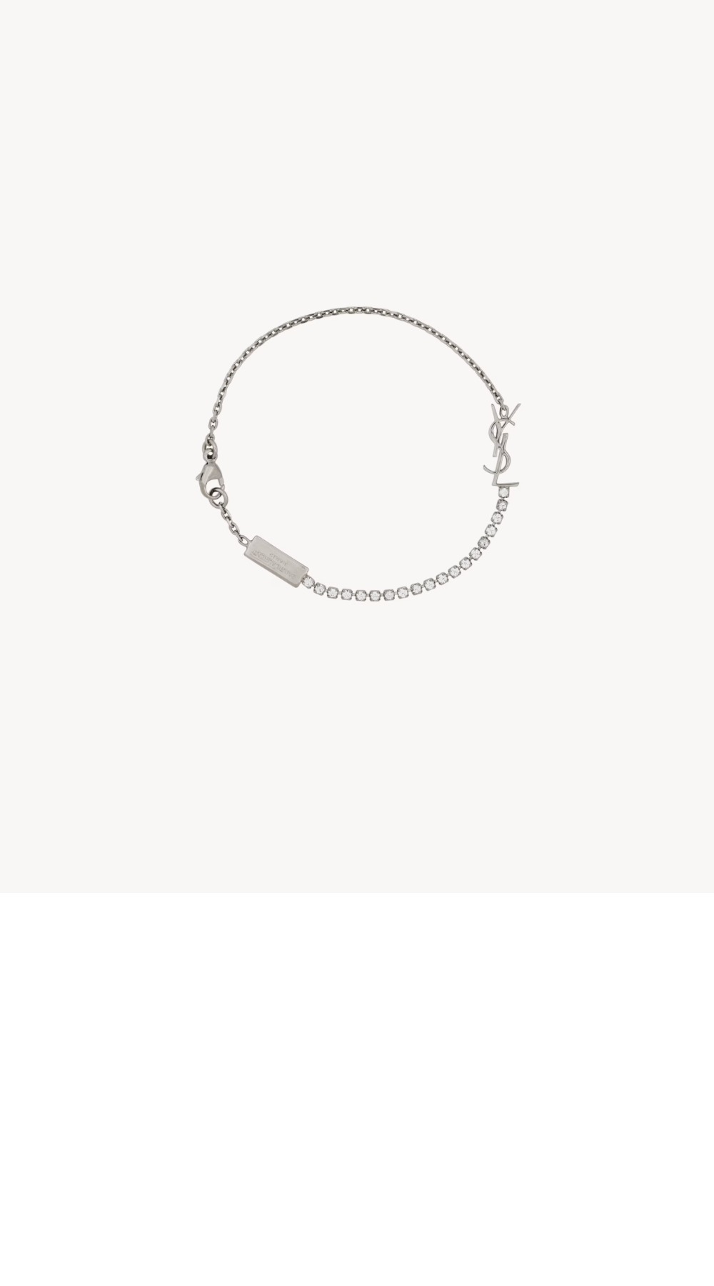 메탈 및 라인스톤 소재의 CASSANDRE 참 브레이슬릿 712345 > 생로랑
