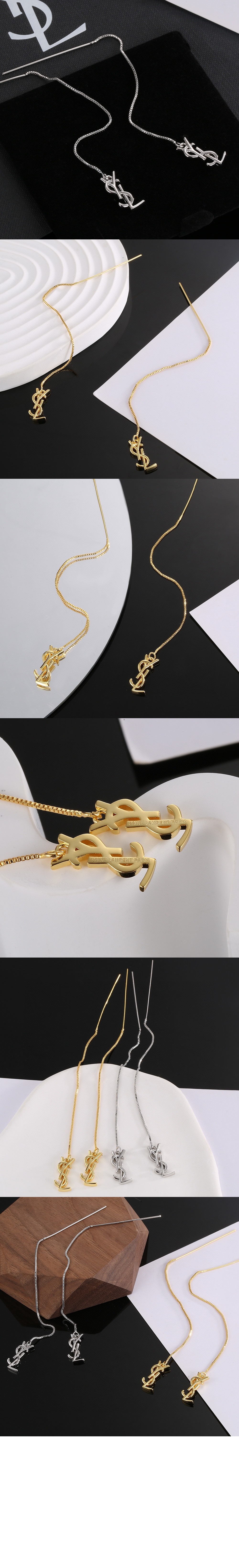 18K 그레이 골드 소재의 CASSANDRE 드롭 이어링 761530 > 생로랑