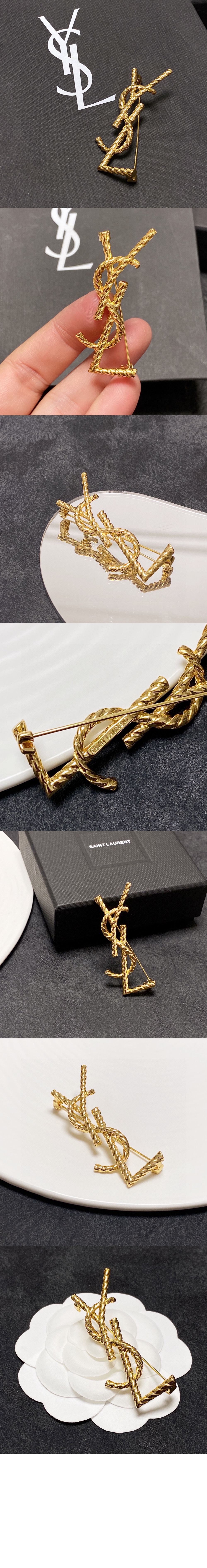 메탈 소재의 CASSANDRE YSL 브로치 652410 > 생로랑