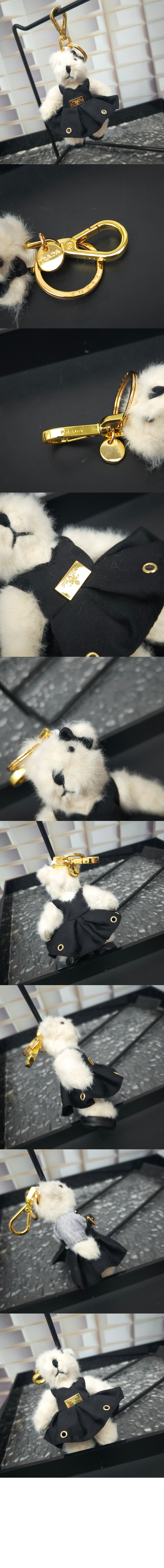 메탈 링이 달린 테디 백 참  1TO050 > 프라다