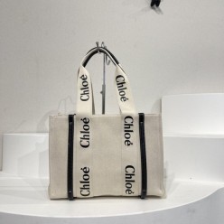 끌** 우디백 미듐