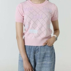 미*** 로고 펀칭 반팔 니트